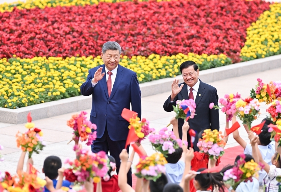 （近观中国）通伦连任后首次正式访问，中老领导人提到一个共同关键词