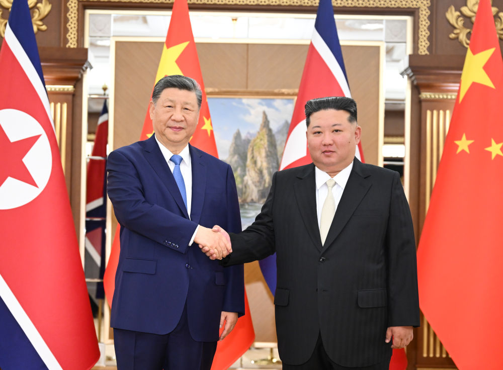 新华图讯丨习近平同金正恩举行会谈