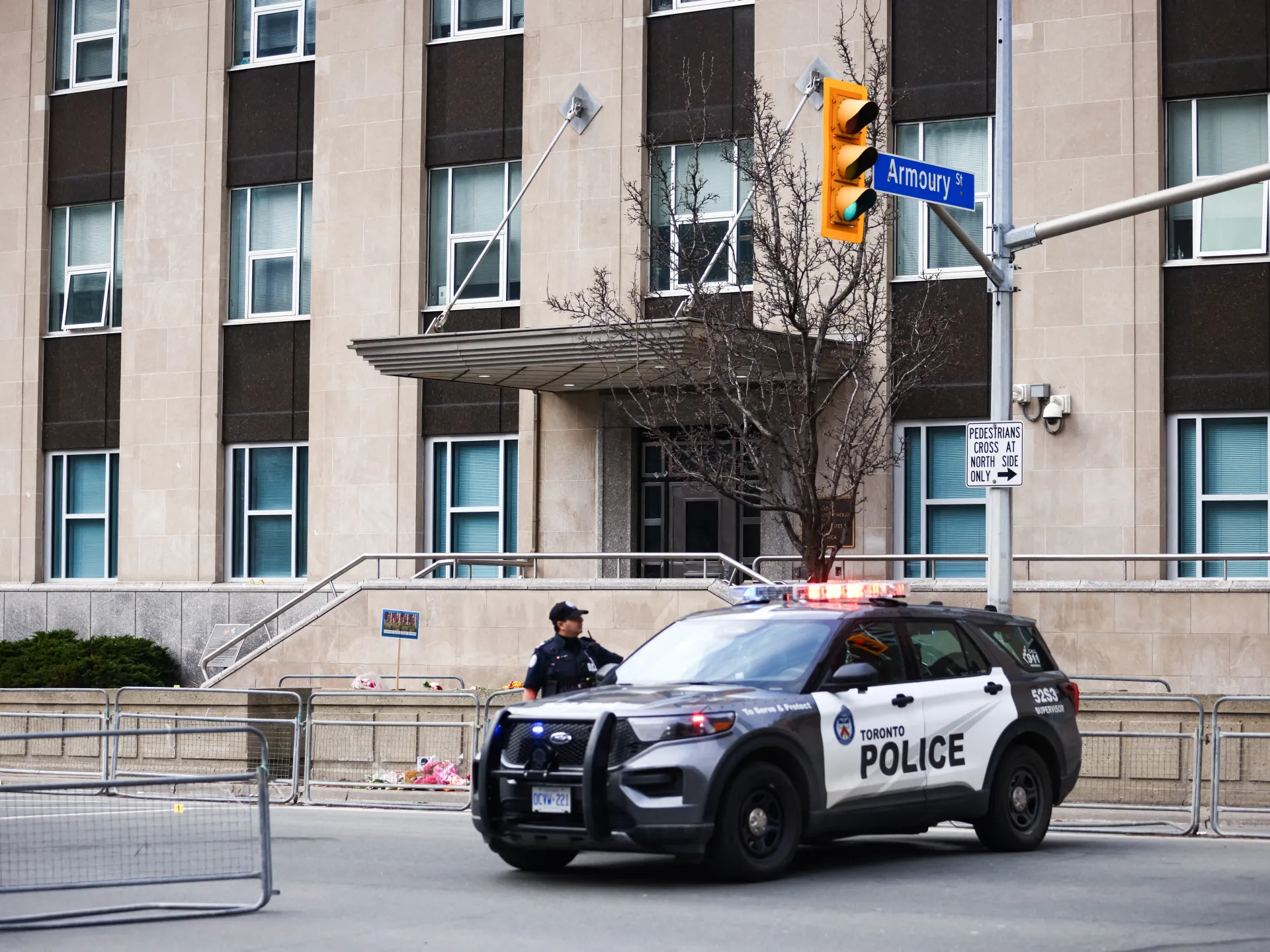 Toronto police officer shot while investigating attack on US consulate