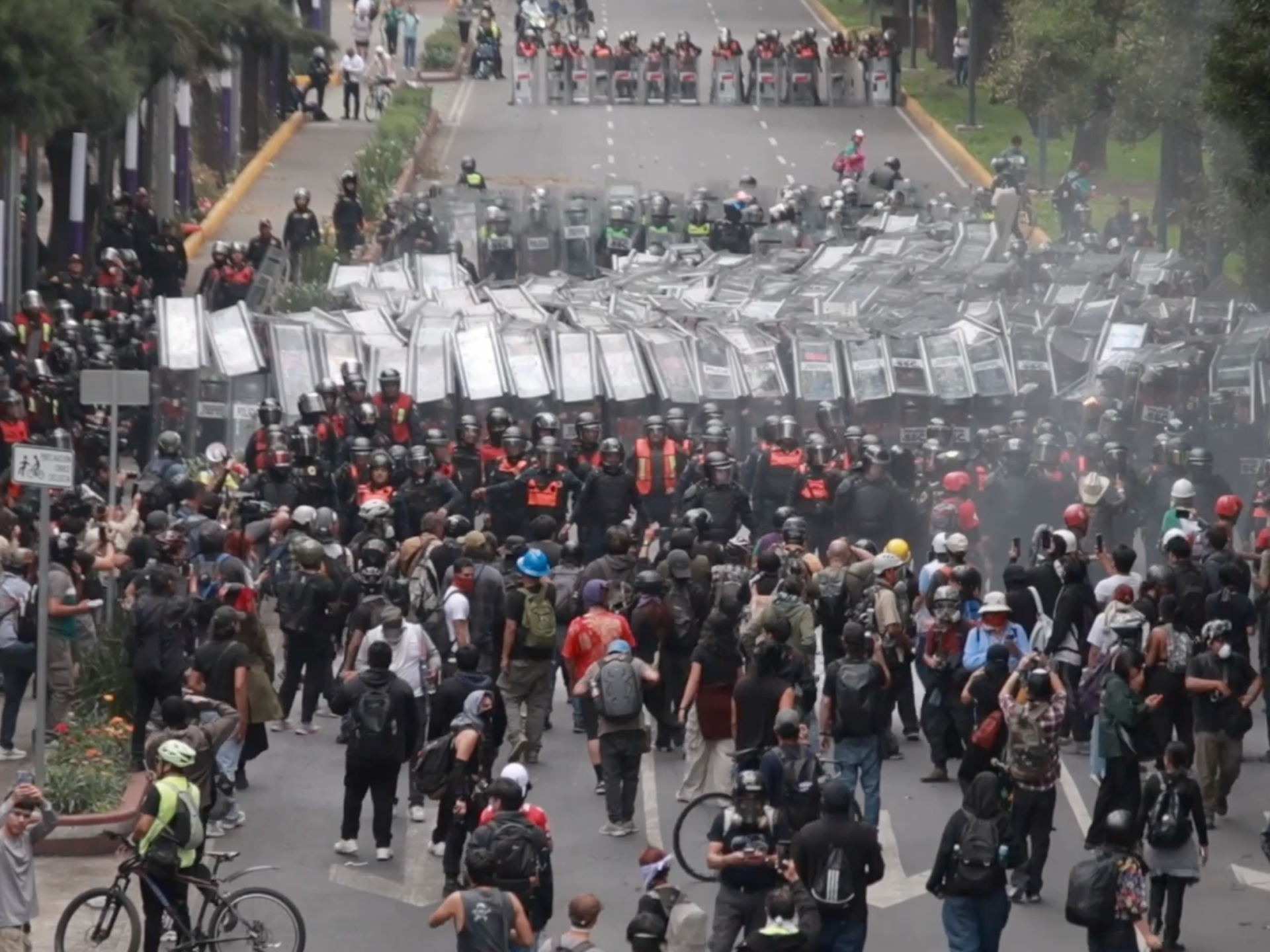 Protesters clash with police during World Cup opening match