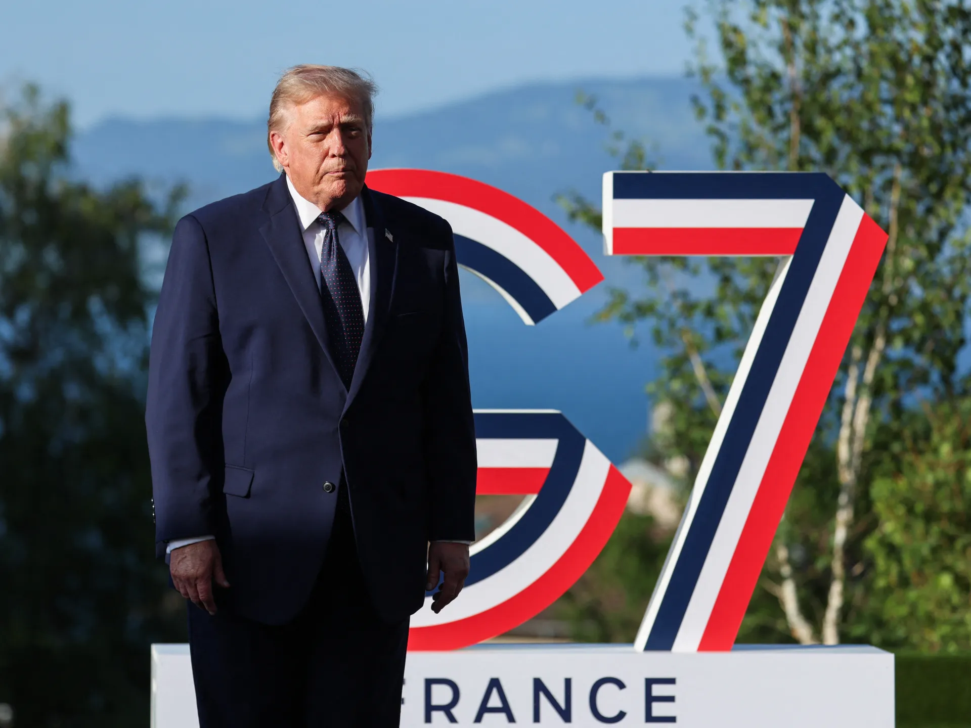 Trump touts Iran deal and Ukraine ambition as he arrives at G7
