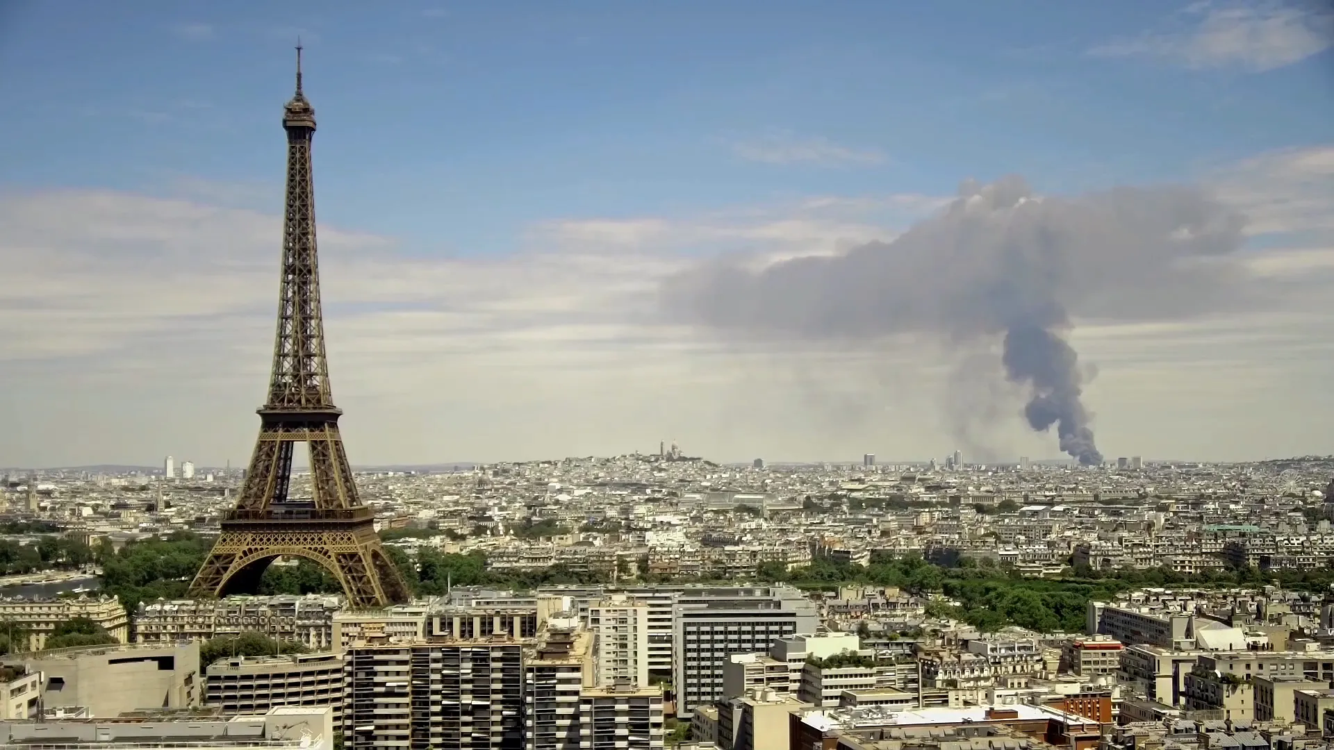 Thick black smoke towers over Paris skyline after warehouse blaze