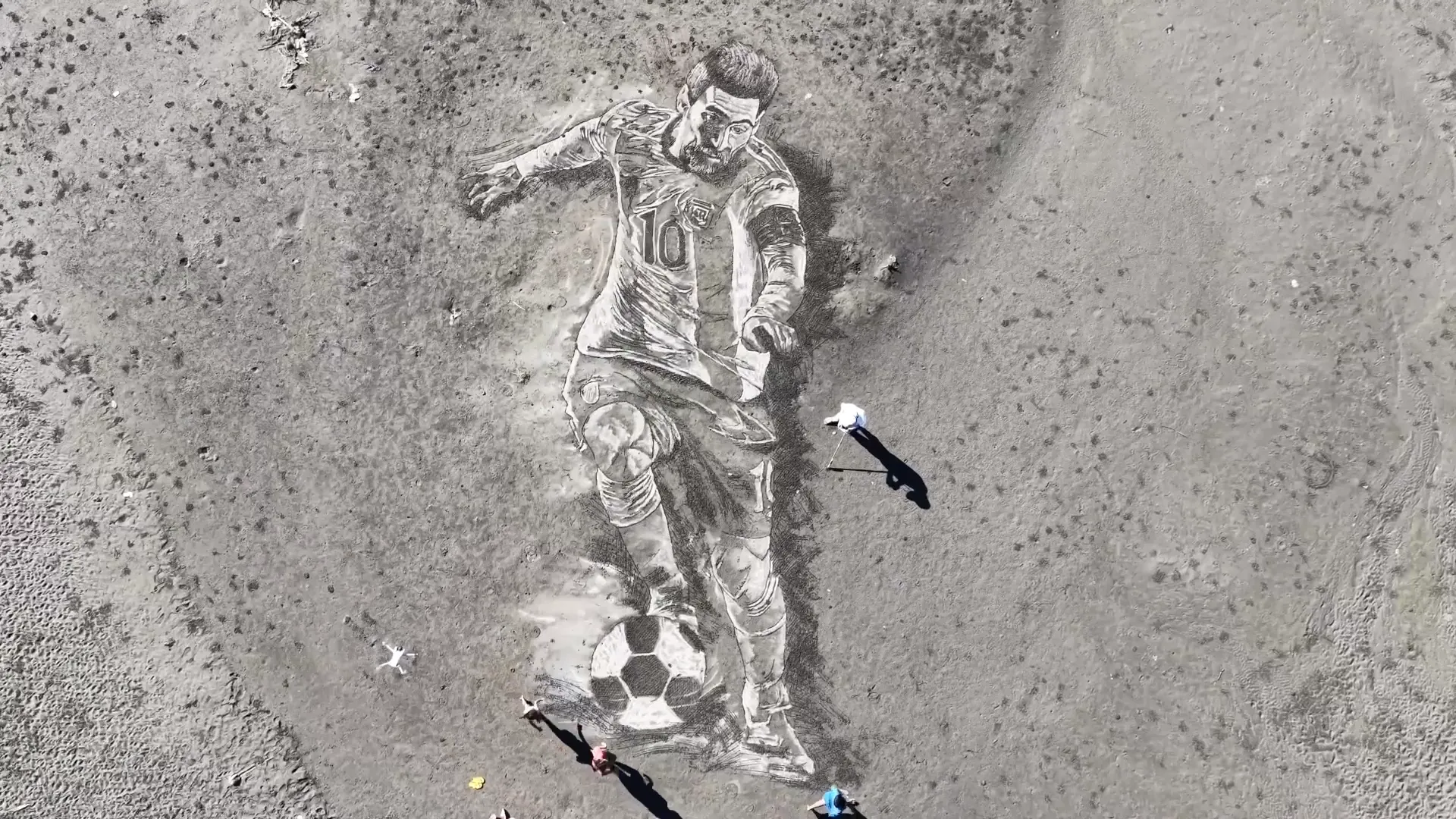 Giant Messi portrait carved into a Philippine beach for the World Cup