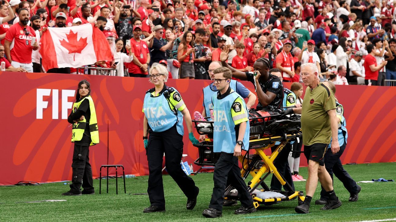 Canada's Koné stretchered off after hard tackle