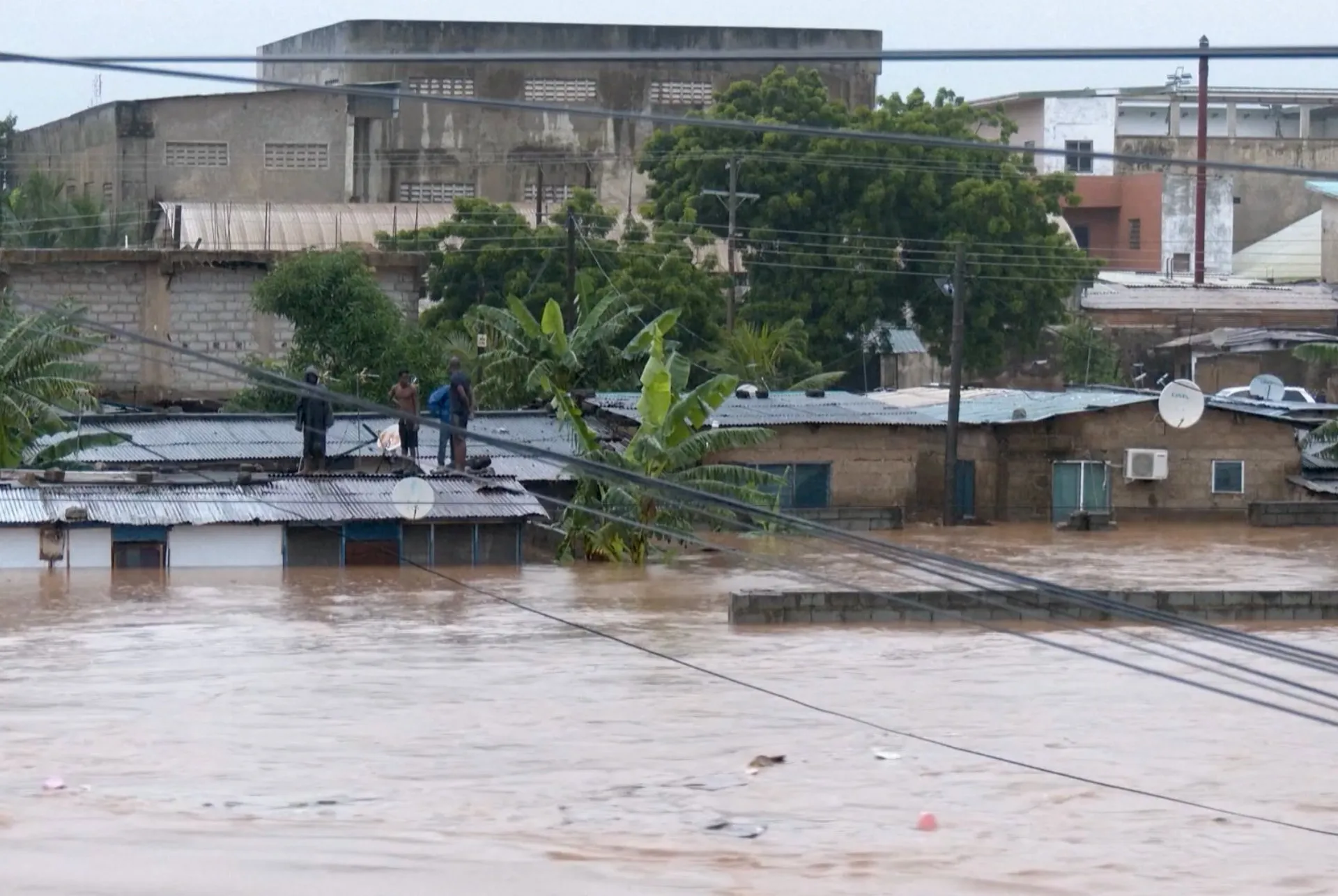 Fire and floods hit Ghana’s capital as residents are left stranded