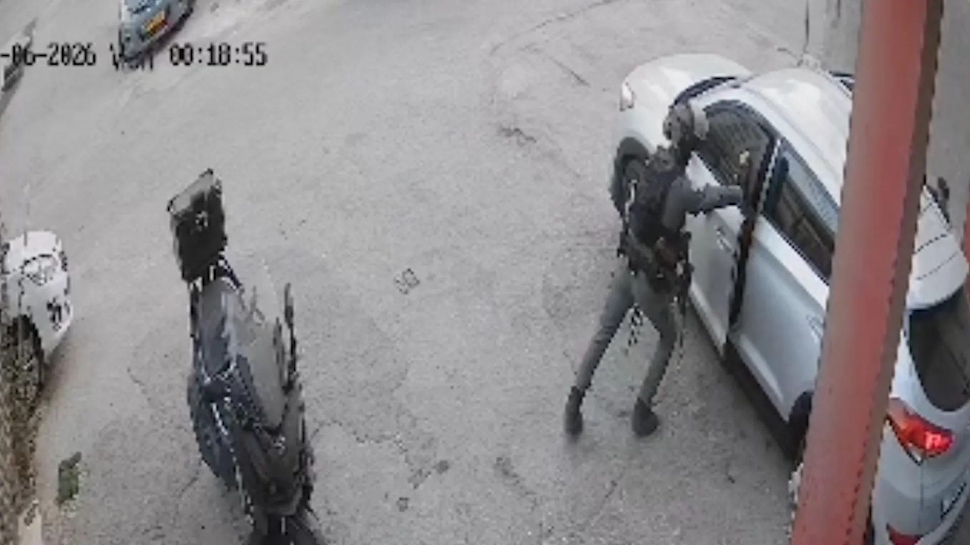 Moment Israeli soldier hurls stun grenade into Palestinians’ car